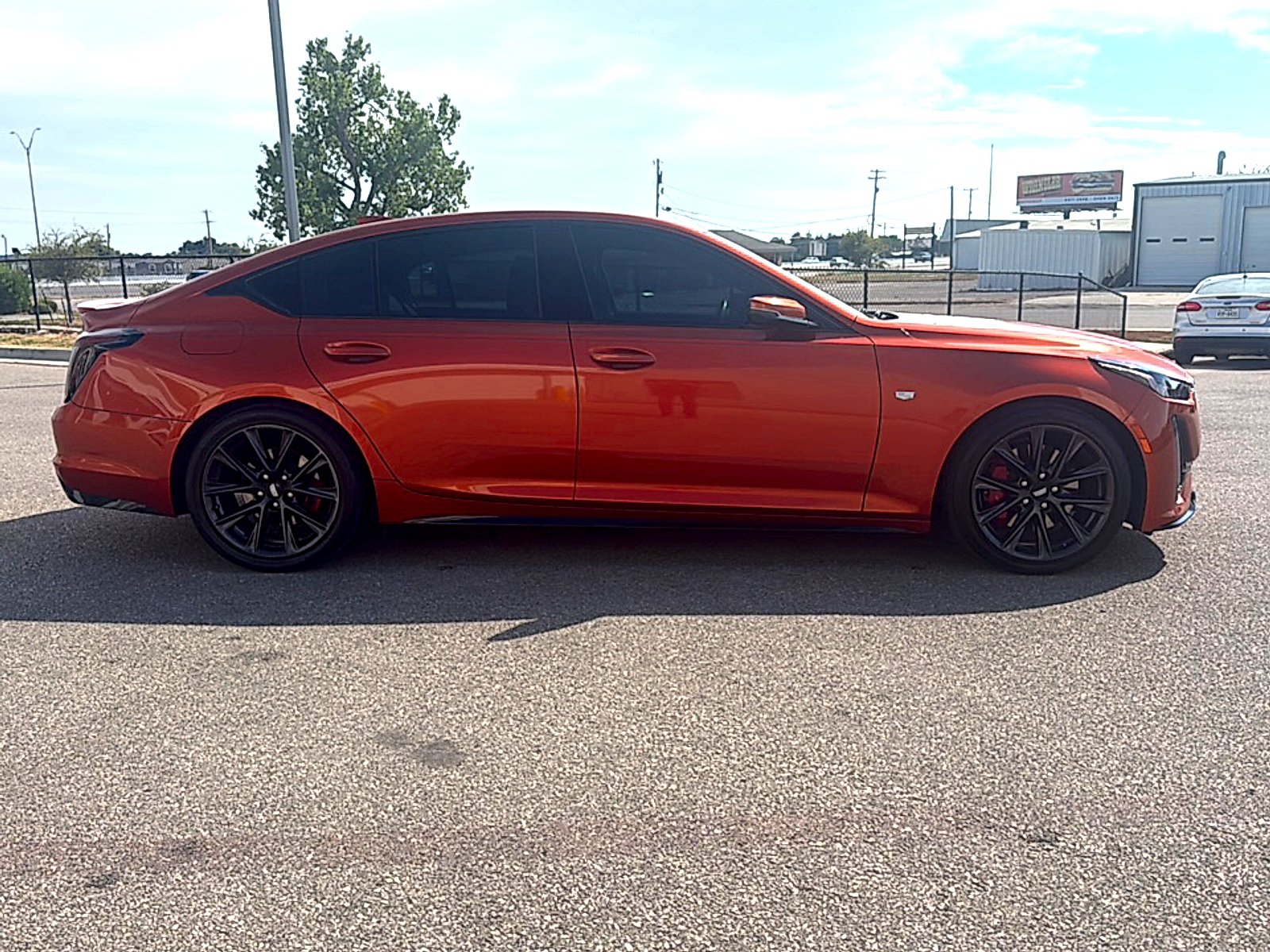 Used 2022 Blaze Orange Metallic Cadillac Sport image 5