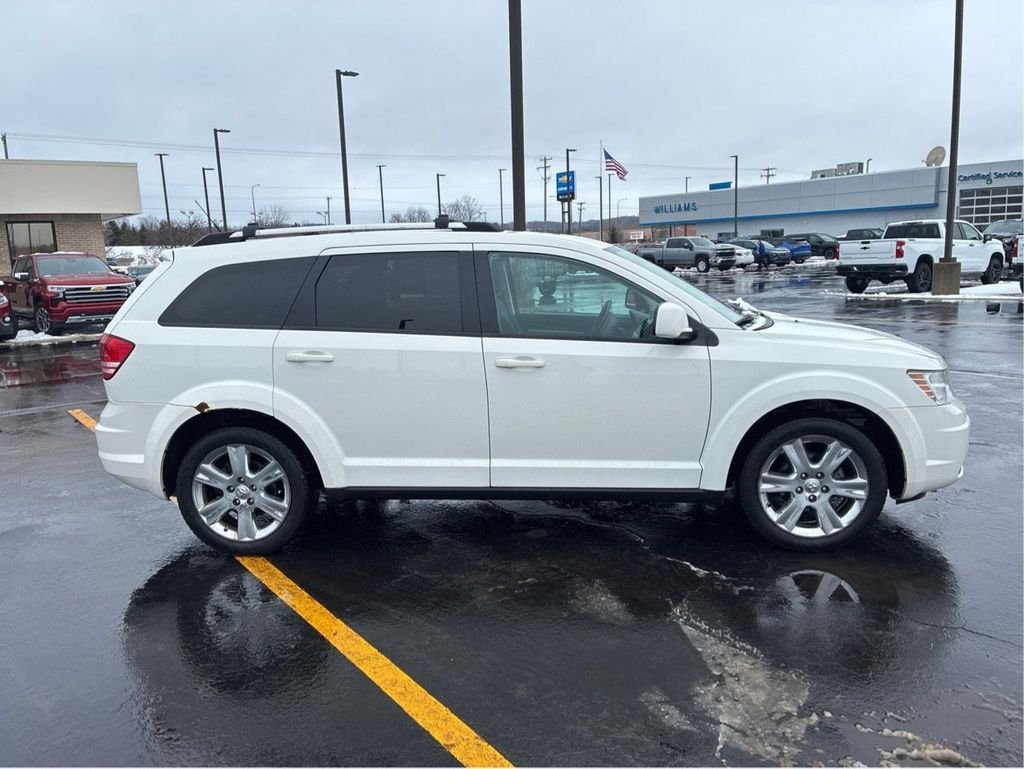 Used 2010 Dodge Journey SXT with VIN 3D4PH5FV9AT244812 for sale in Traverse City, MI