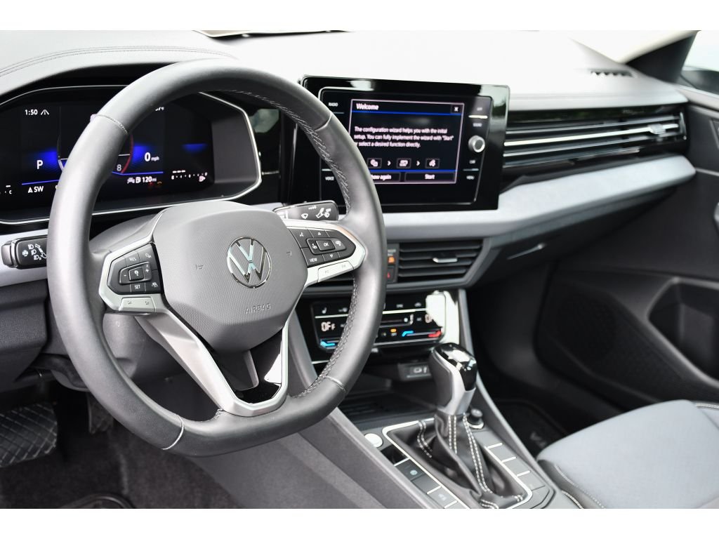 Used 2025 Opal White Pearl Volkswagen SE image 13
