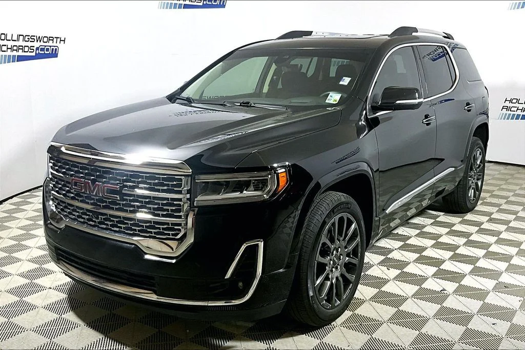 Used 2023 Ebony Twilight Metallic GMC Denali image 1