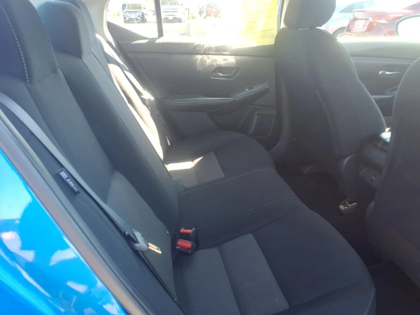 Used 2025 Electric Blue Metallic Nissan SV image 16
