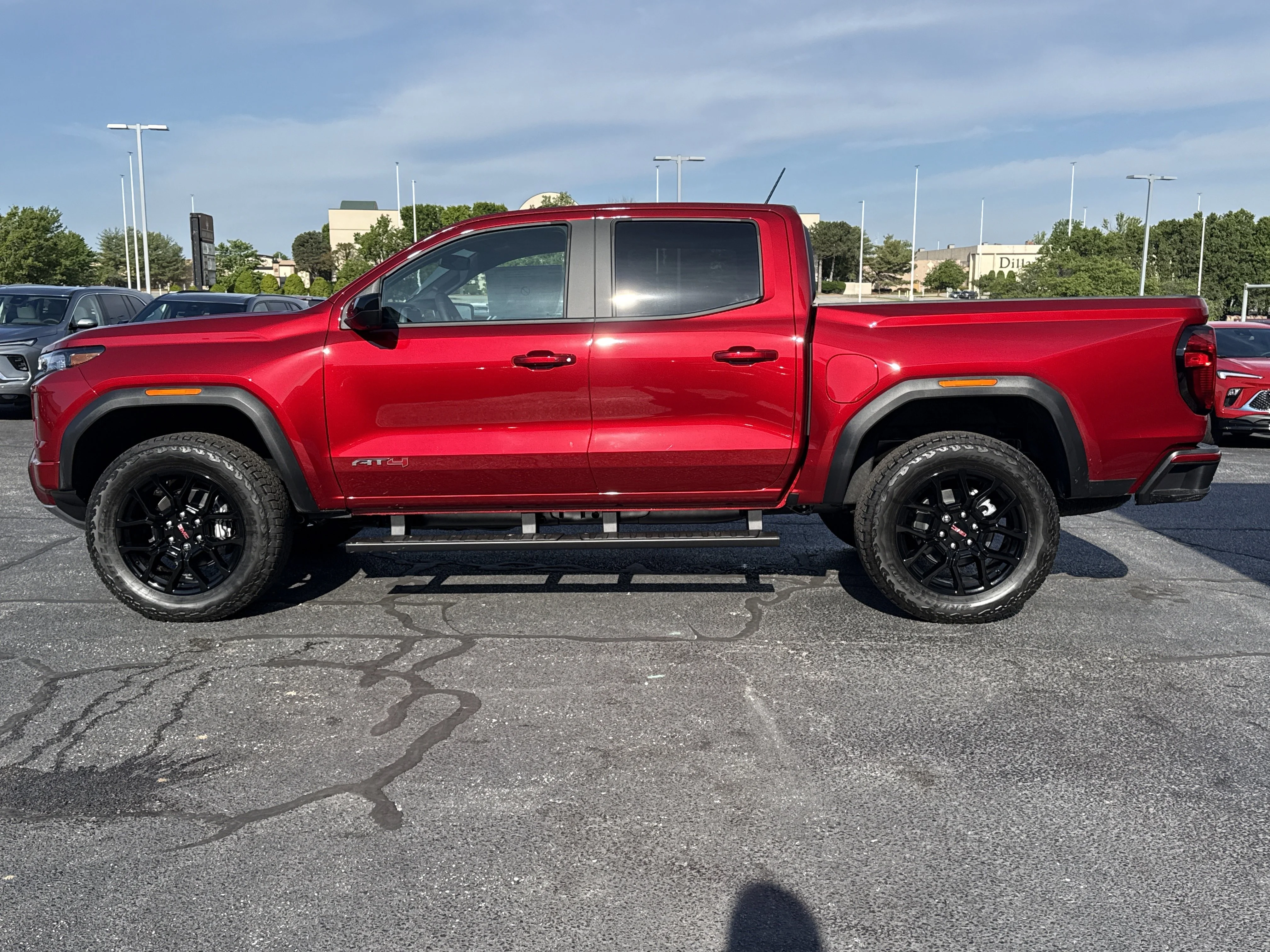 New 2026 Volcanic Red Tintcoat GMC 4WD AT4 image 12