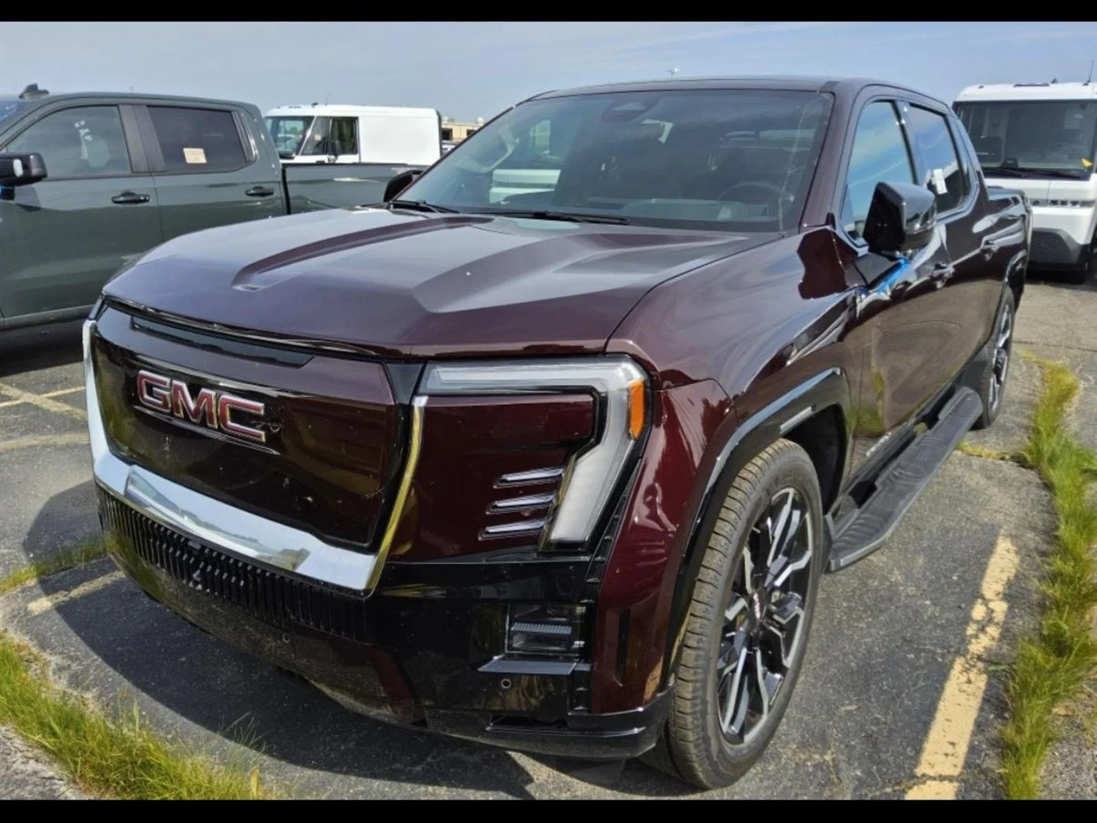 Used 2026 Dark Ember Metallic GMC Denali Max Range image 2