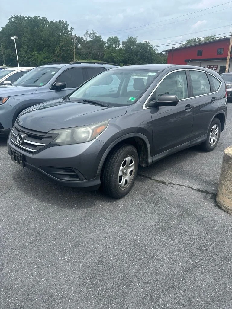 Used 2013 Alabaster Silver Metallic Honda LX image 1