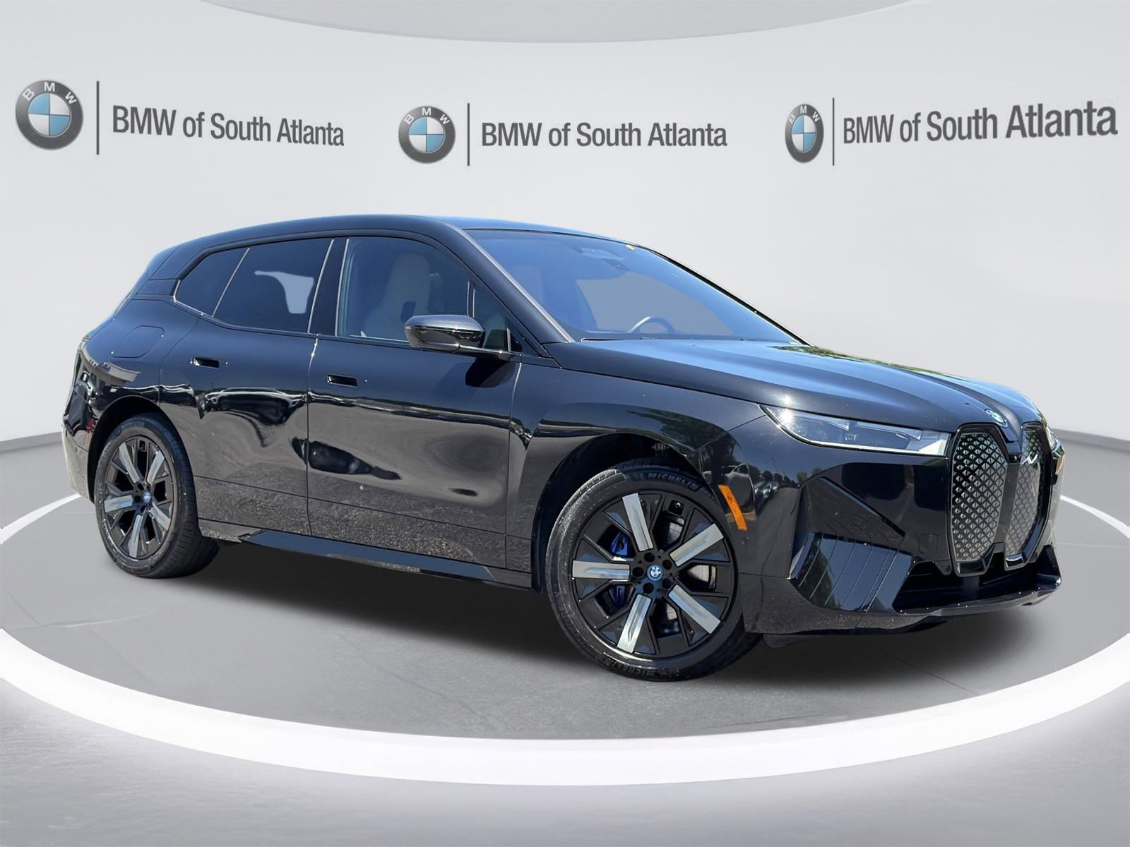 Used 2024 Black Sapphire Metallic BMW xDrive50 image 2