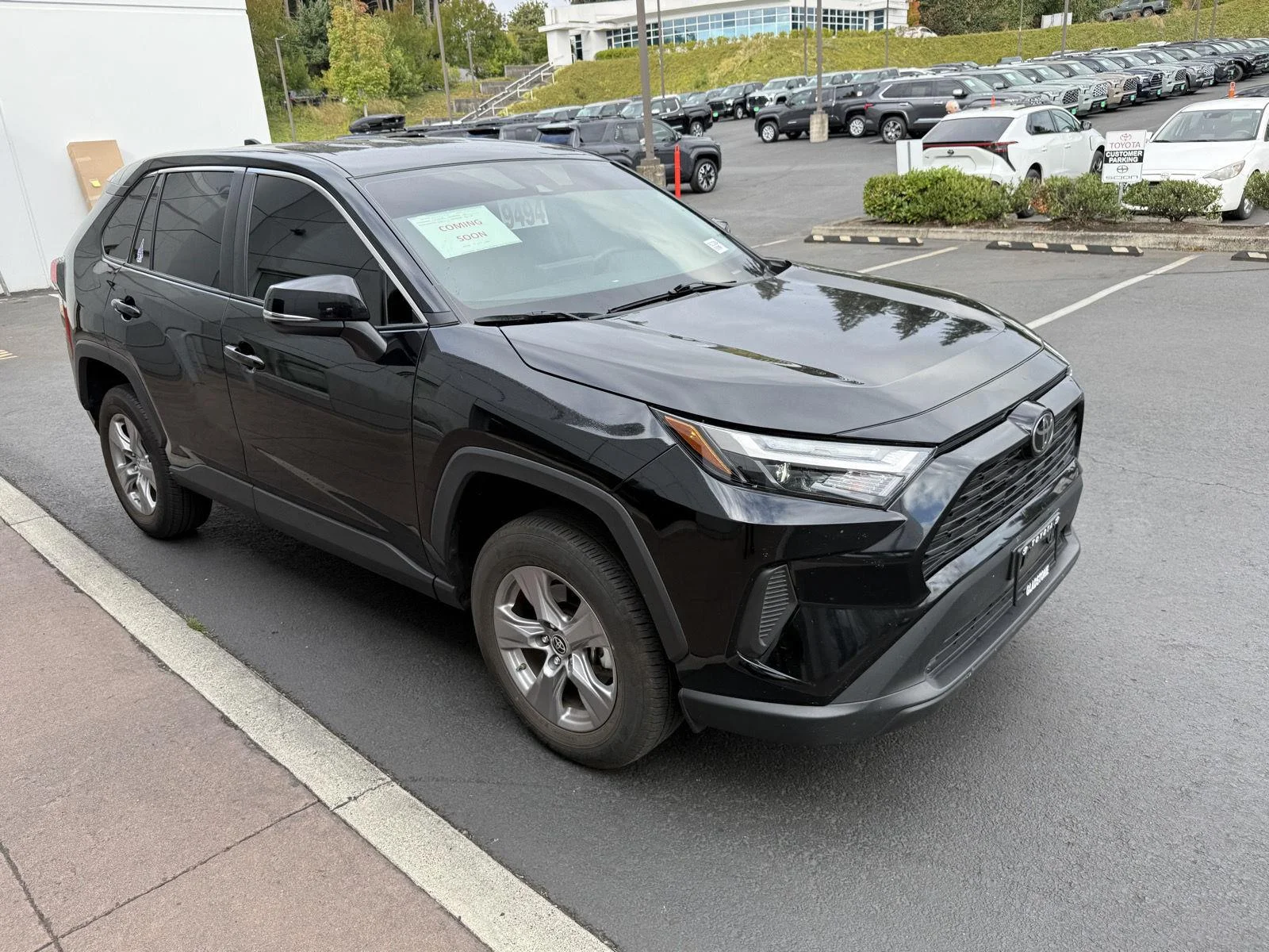 Used 2025 Midnight Black Metallic Toyota LE image 7