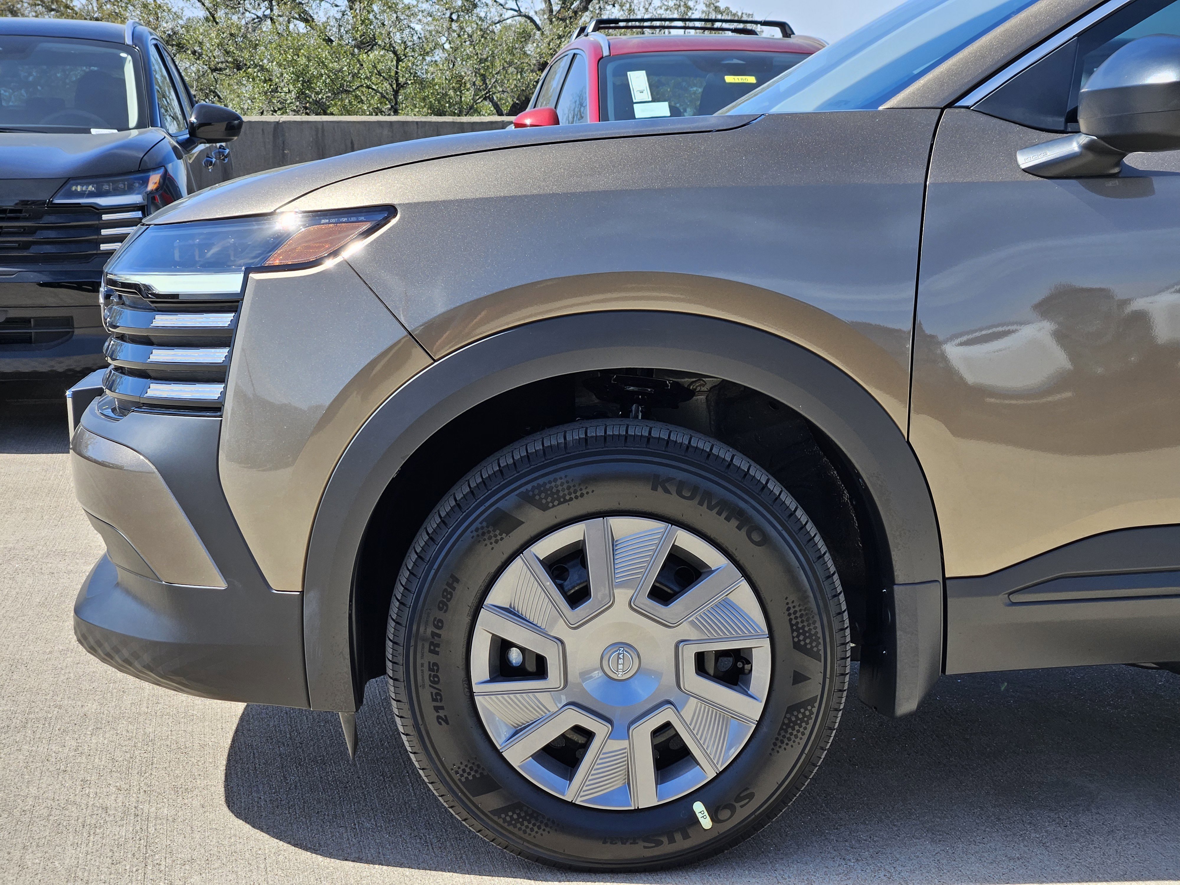 New 2026 Canyon Bronze Metallic Nissan S image 9