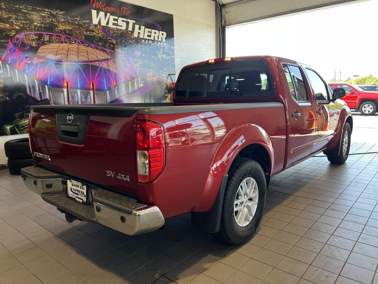 Used 2016 Lava Red Nissan SV image 8