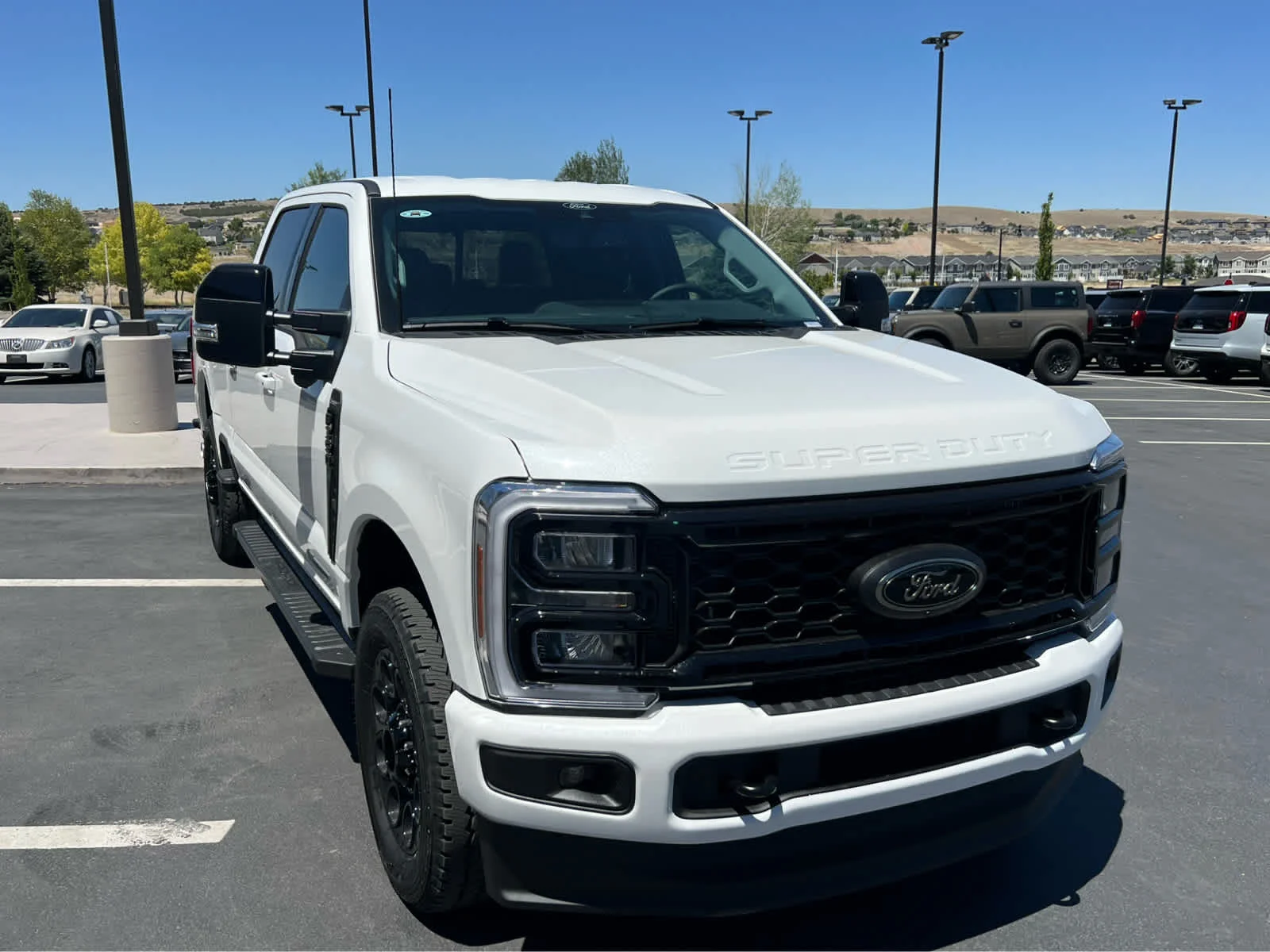 New 2026 Star White Metallic Tri-Coat Ford F-350® Lariat® image 4