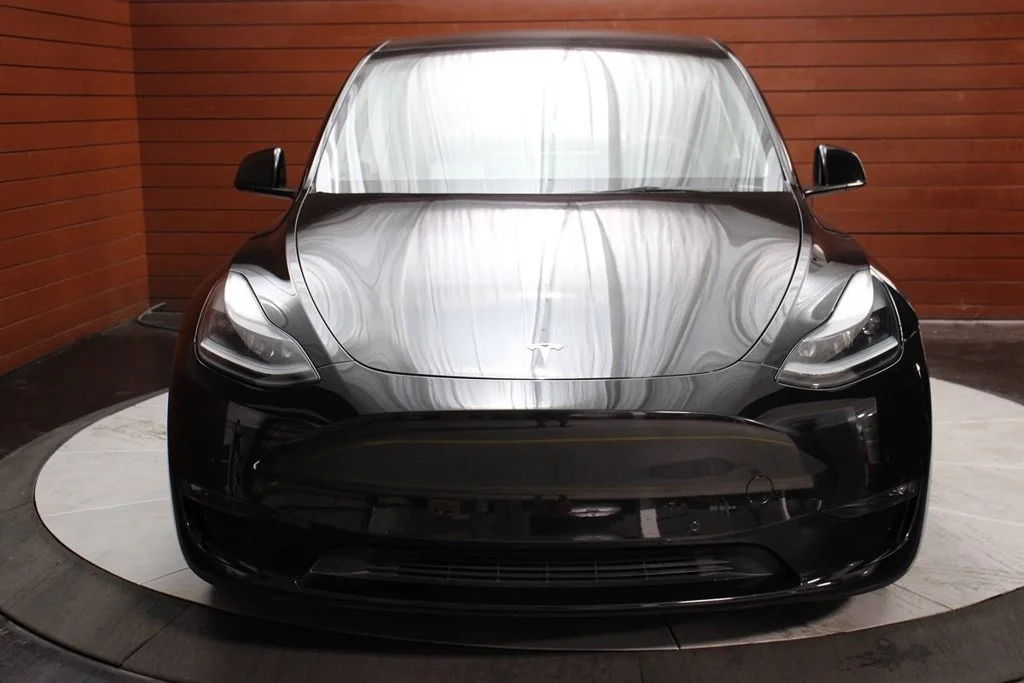 Used 2022 Solid Black Tesla Performance image 13