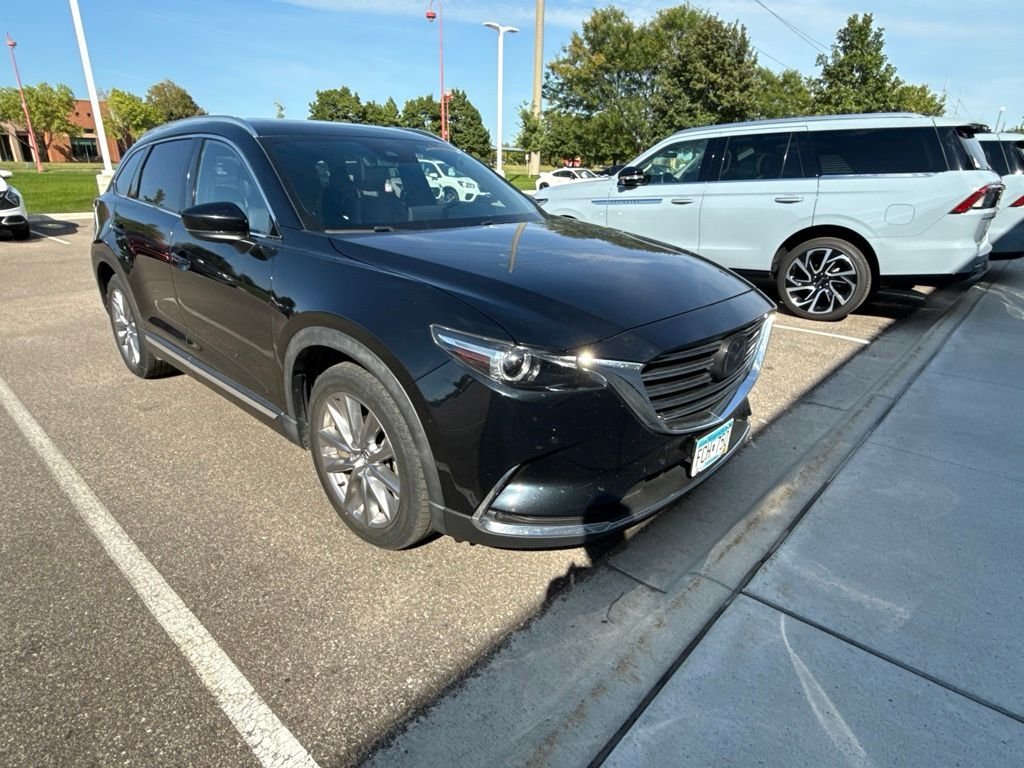 Used 2020 Black Mazda Grand Touring image 1