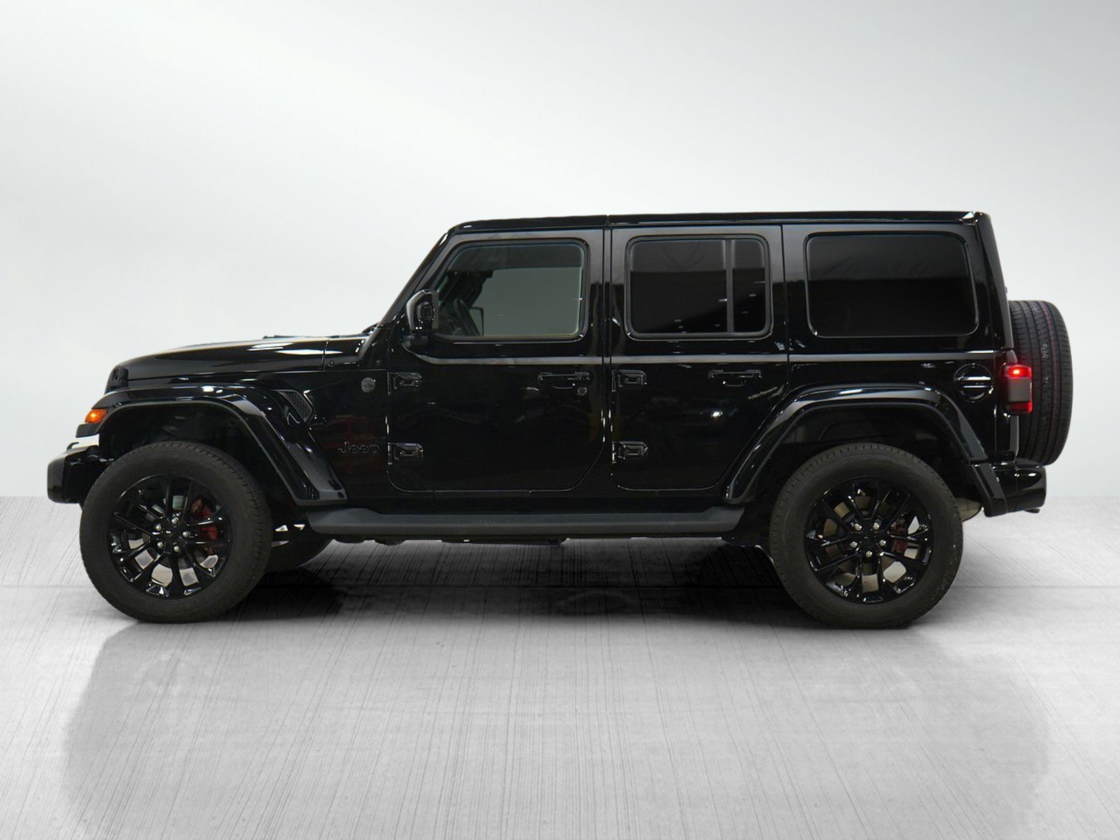 Used 2022 Jeep Wrangler Unlimited High Altitude with VIN 1C4HJXEG9NW192859 for sale in Minneapolis, Minnesota