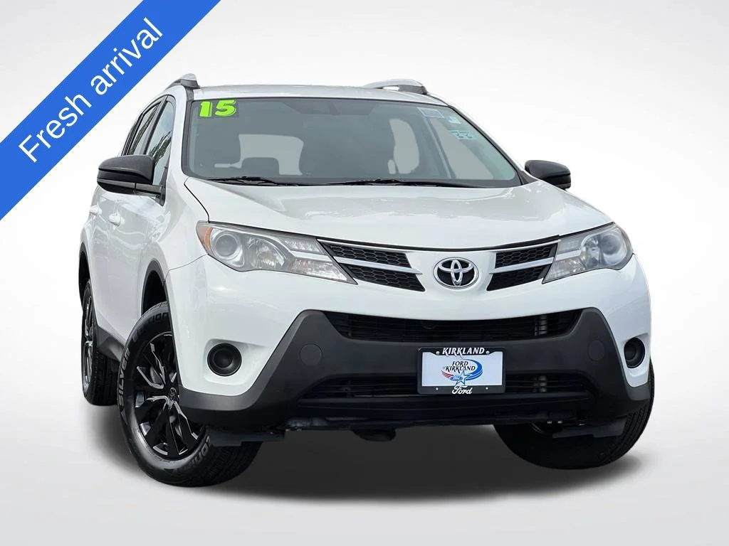 Used 2015 Super White Toyota LE image 1