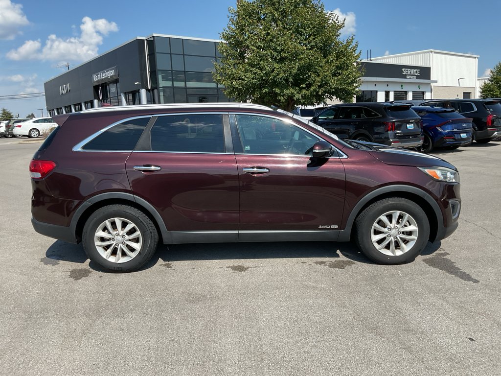 Used 2016 Dark Cherry Kia LX image 10