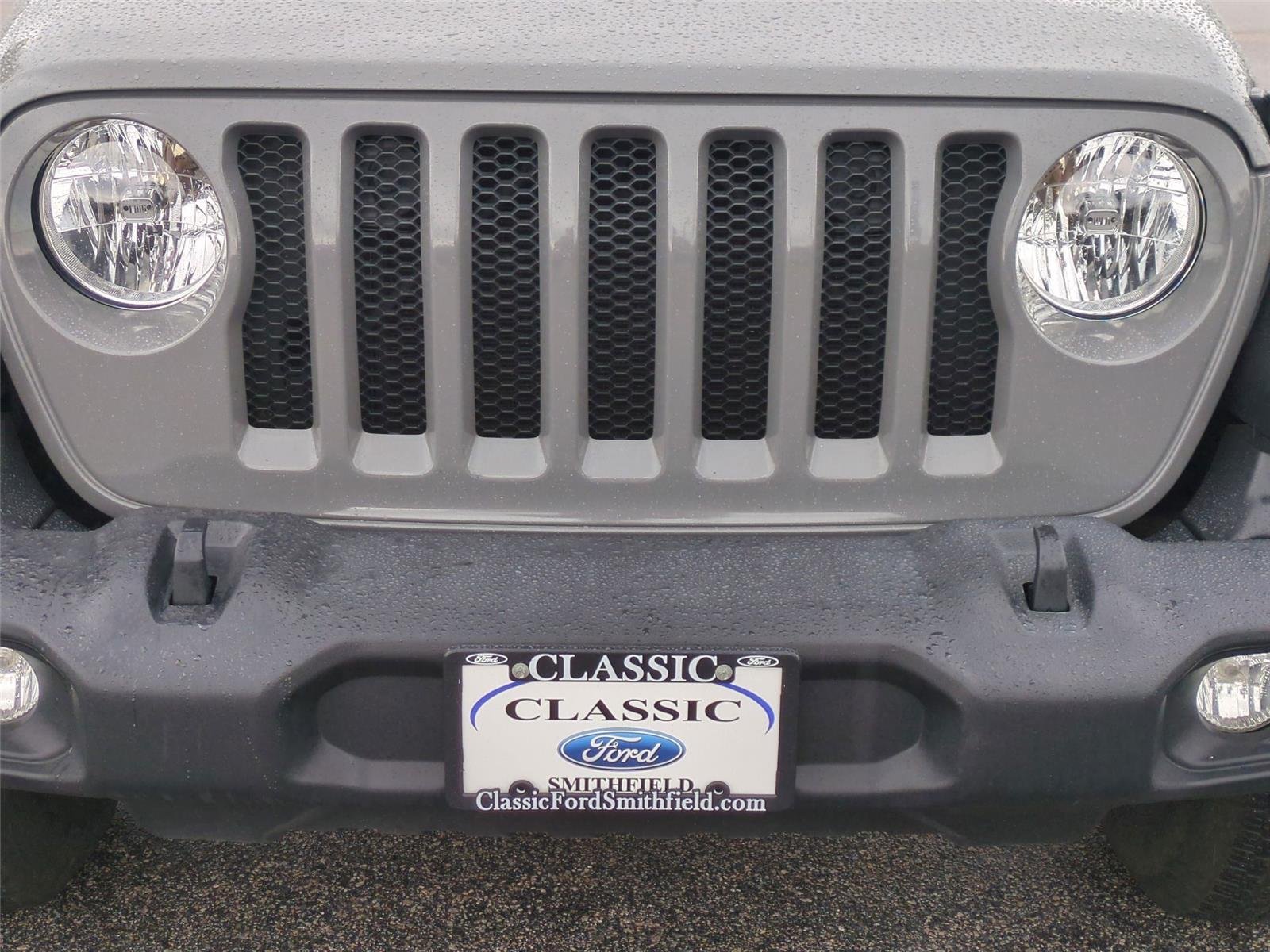 Used 2021 Granite Crystal Metallic Clearcoat Jeep Unlimited Sport S image 14