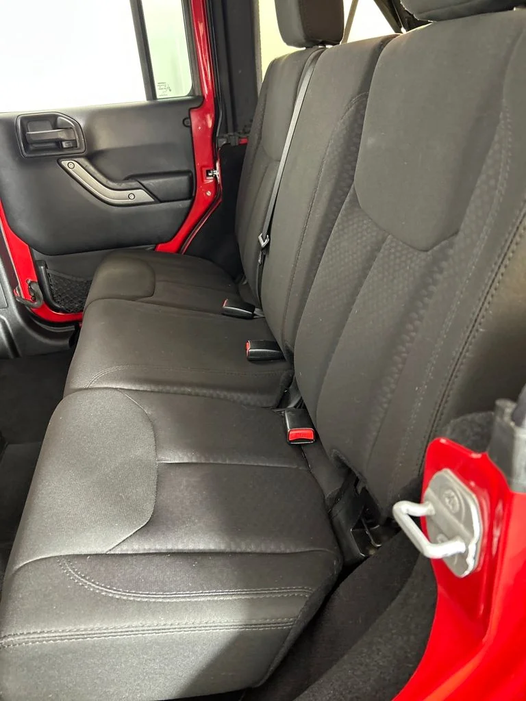 Used 2014 Red Jeep Unlimited Sport image 17