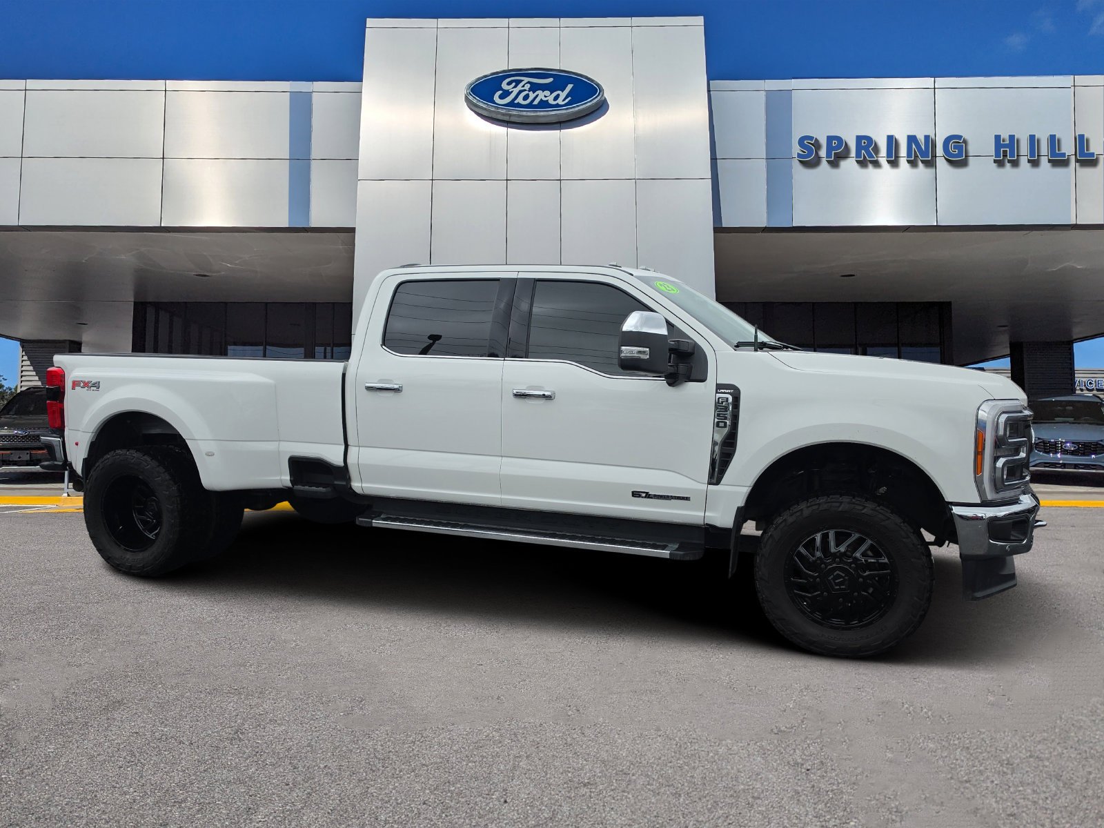 Certified Used 2023 White Metallic Ford Lariat image 1