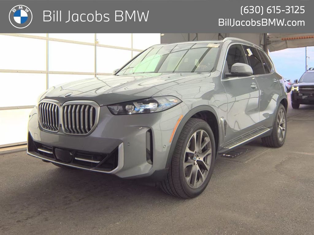 Certified Used 2026 Skyscraper Grey Metallic BMW xDrive40i image 1