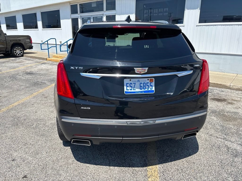 Used 2017 STELLAR BLACK METALLIC Cadillac Premium Luxury AWD image 2