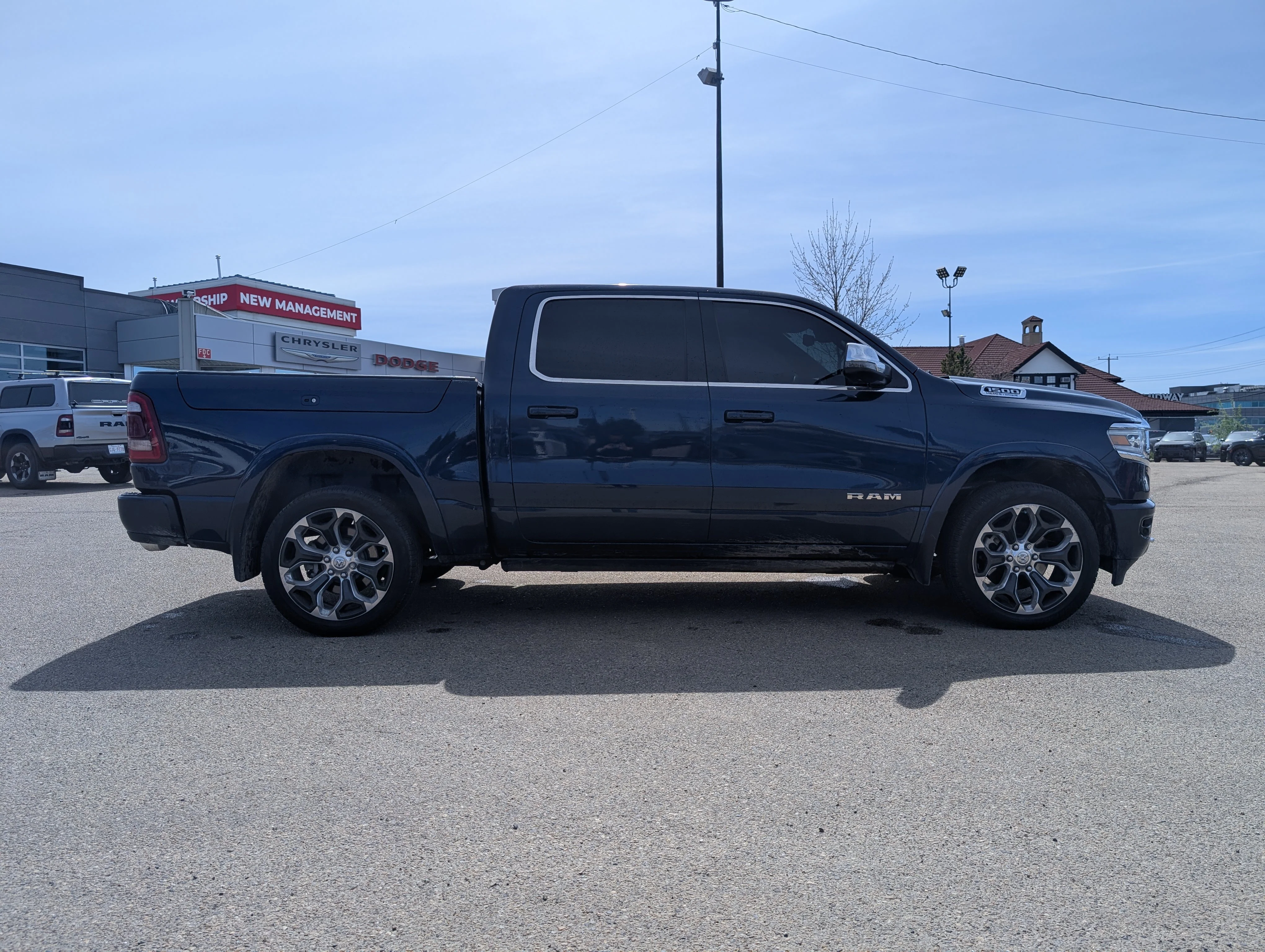 Used 2024 Patriot Blue Pearl Ram Limited Longhorn image 8
