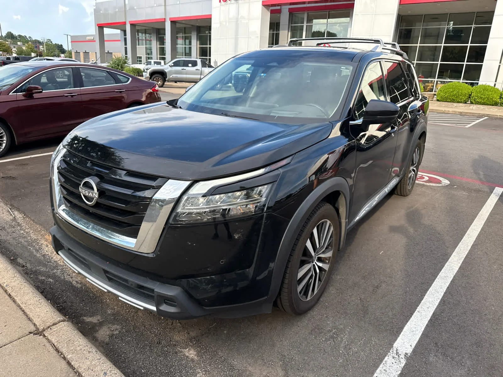 Used 2024 Super Black Nissan Platinum image 5