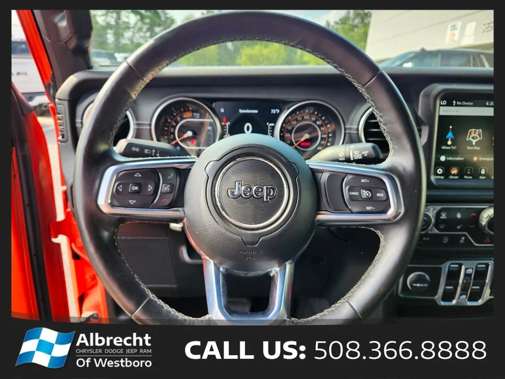 Used 2020 Orange Jeep Unlimited Sahara image 27