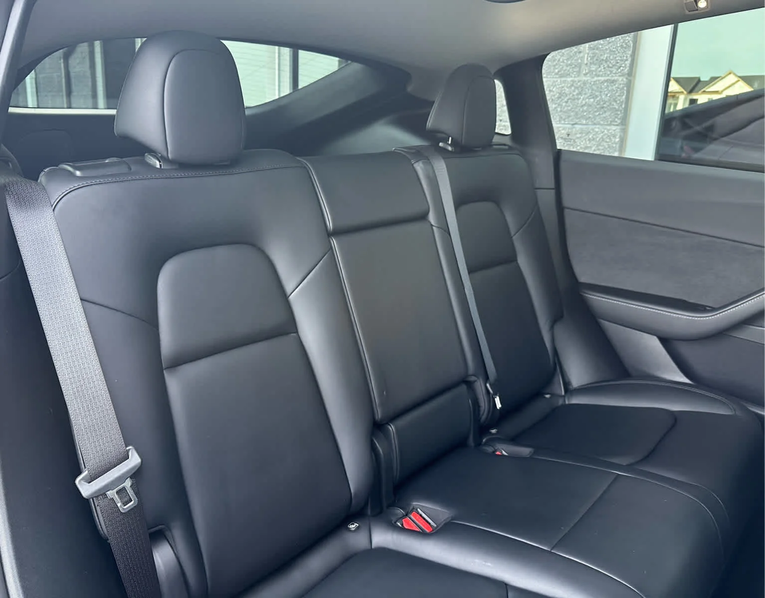 Used 2022 Solid Black Tesla Performance image 13