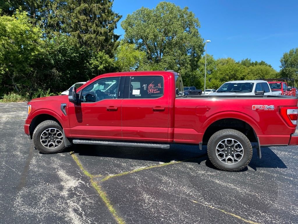 Used 2023 Rapid Red Metallic Tinted Clearcoat Ford Lariat image 6