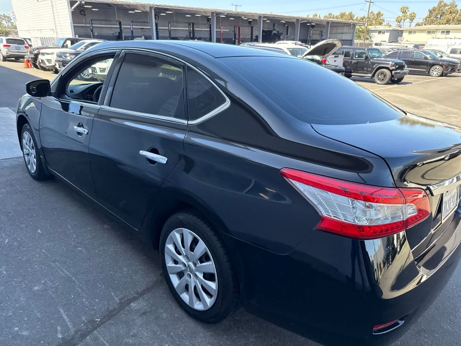 Used 2014 Super Black Nissan S image 22