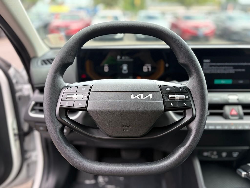Used 2025 Snow White Pearl Kia LX image 17