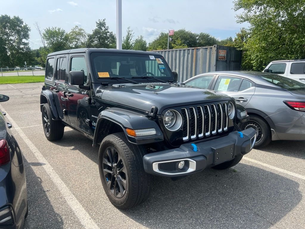 Used 2023 Black Jeep Sahara 4xe image 1