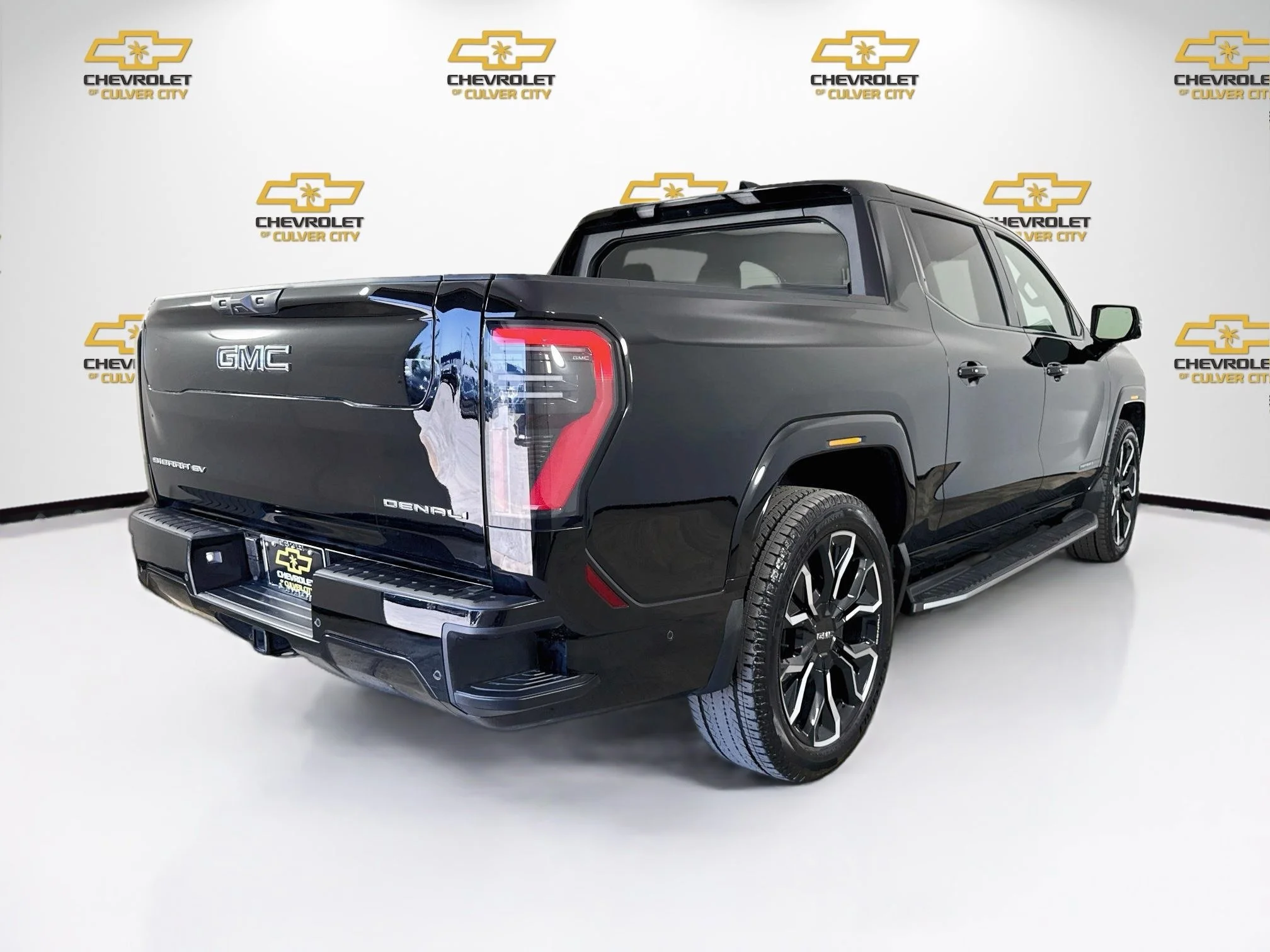 Used 2025 Onyx Black GMC Max Range Denali image 8