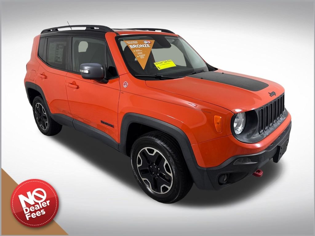 Used 2016 Orange Jeep Trailhawk image 1