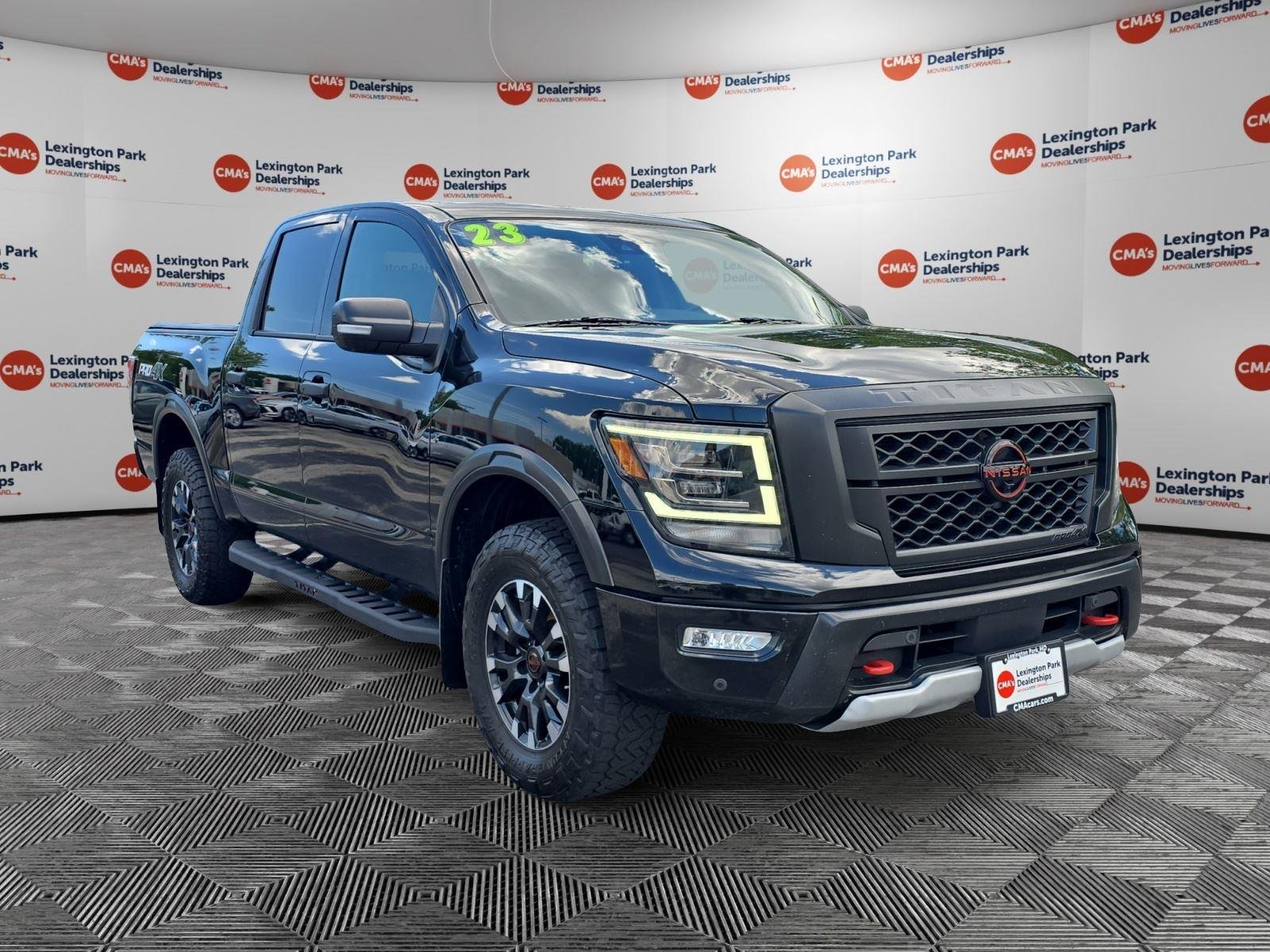 Used 2023 Super Black Nissan PRO-4X image 1
