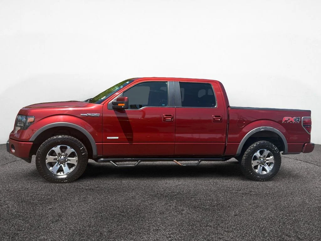 Used 2014 Orange Ford FX4 image 2