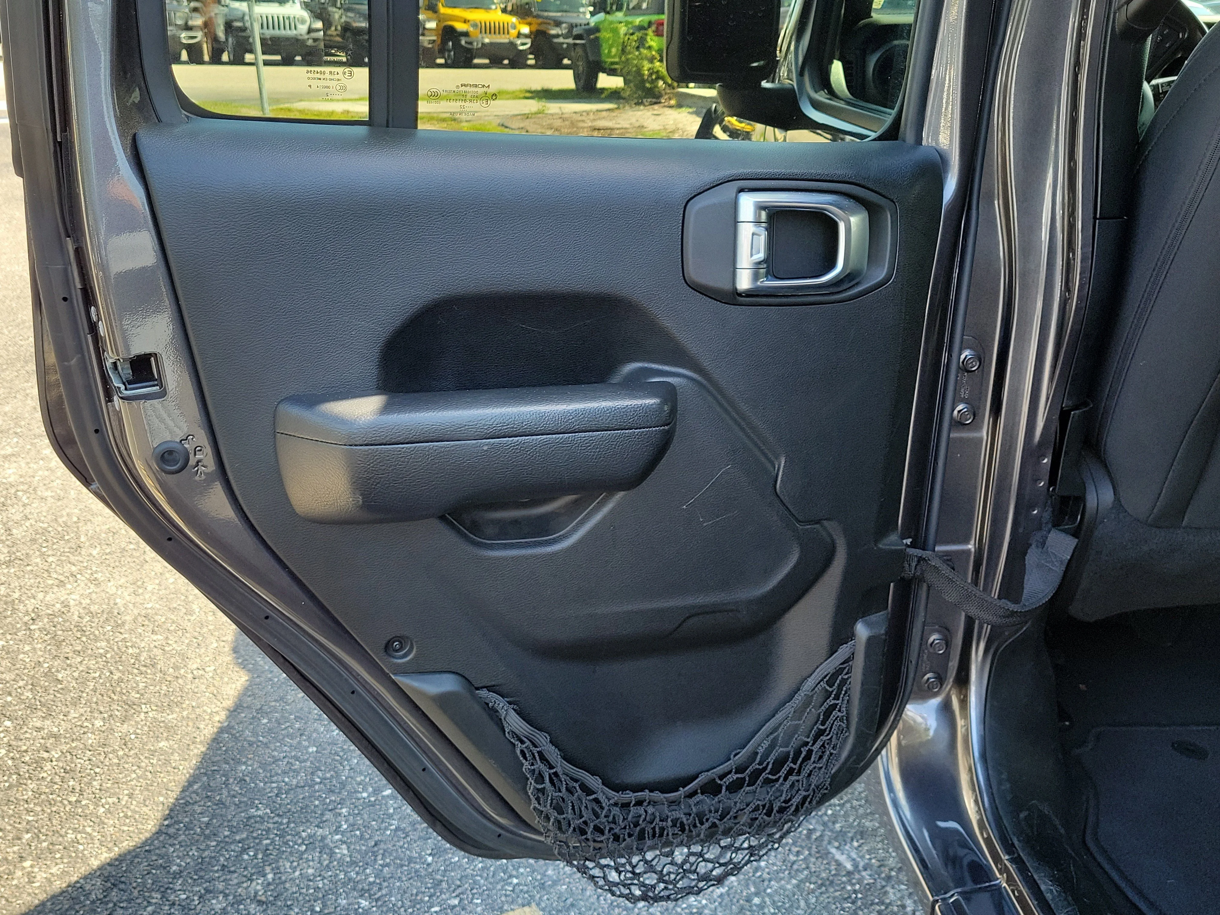 Used 2022 Granite Crystal Metallic Clearcoat Jeep Sport S image 13