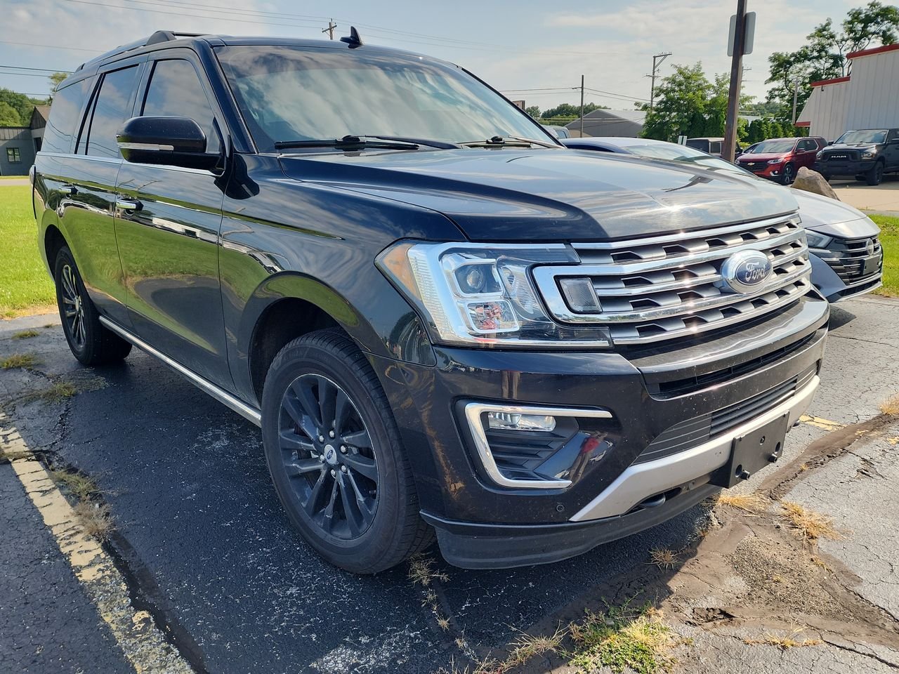 Used 2019 Black Metallic Ford Limited image 1