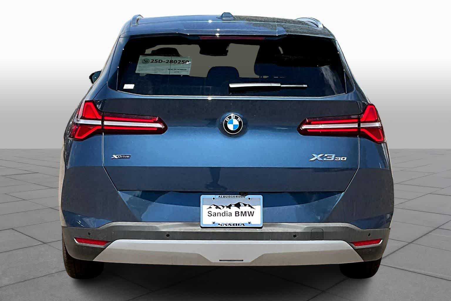 New 2026 Arctic Race Blue metallic BMW 30 xDrive image 4