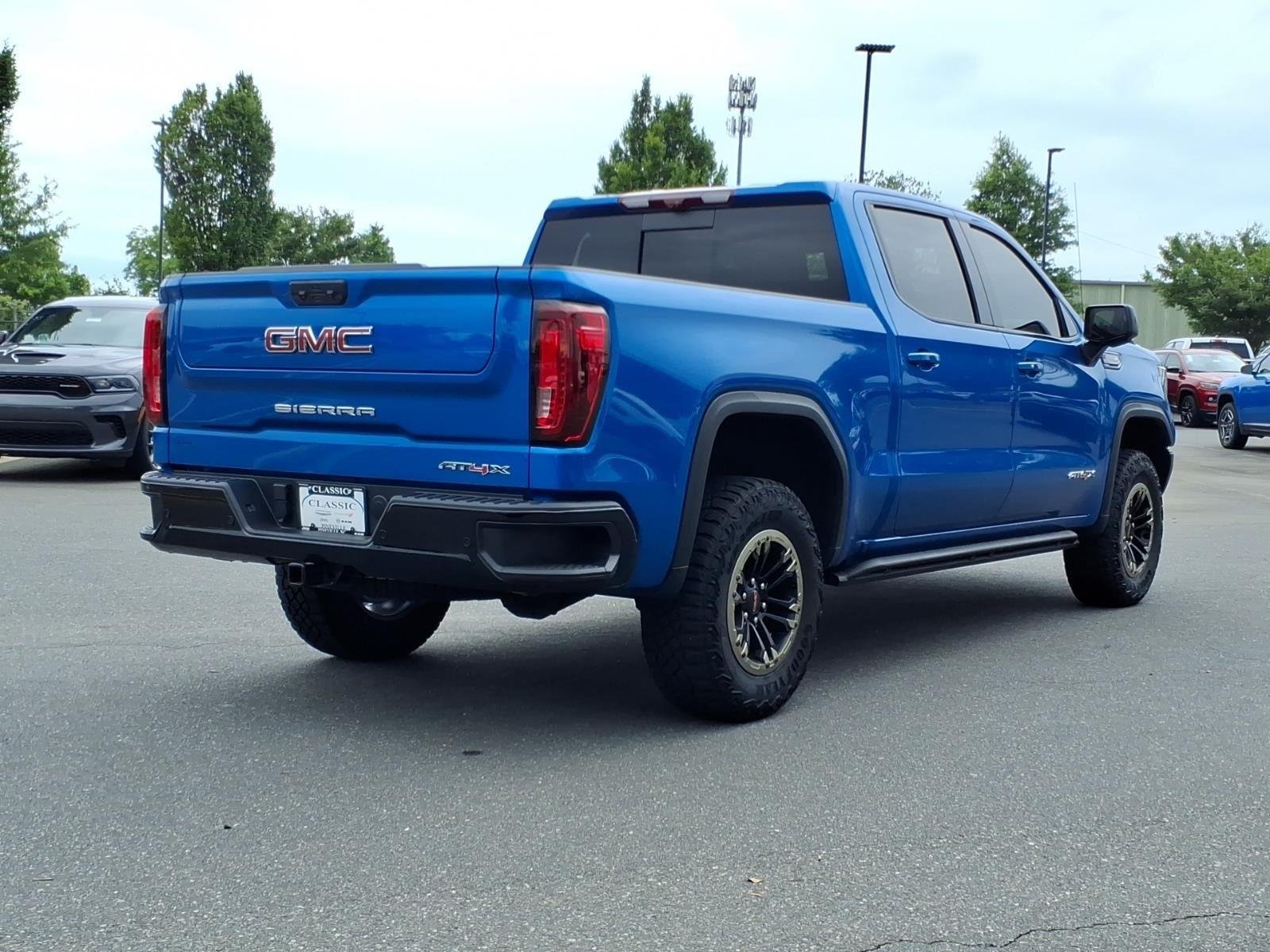Used 2024 Dynamic Blue Metallic GMC AT4X image 2