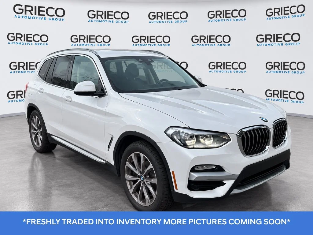 Used 2019 White BMW xDrive30i image 1