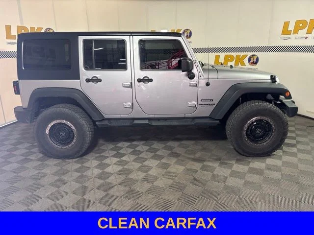 Used 2014 Billet Metallic Clearcoat Jeep Unlimited Sport image 2