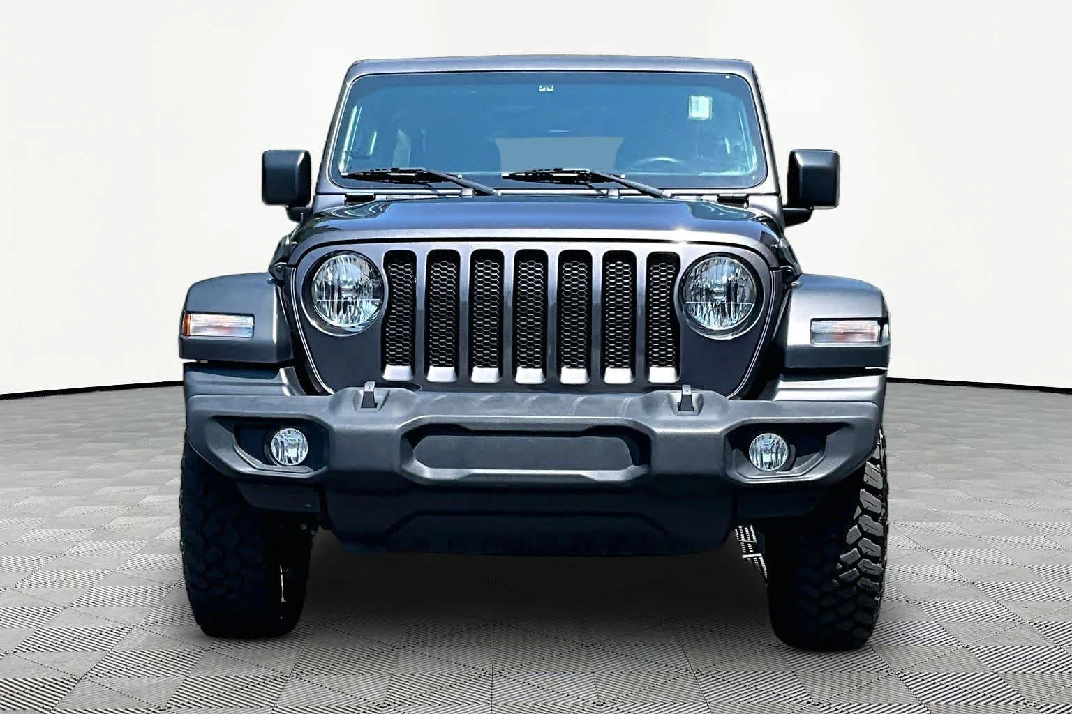 Used 2023 Granite Crystal Metallic Clearcoat Jeep Sport image 4