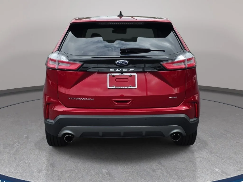 Certified Used 2023 Rapid Red Metallic Tinted Clearcoat Ford Titanium image 6