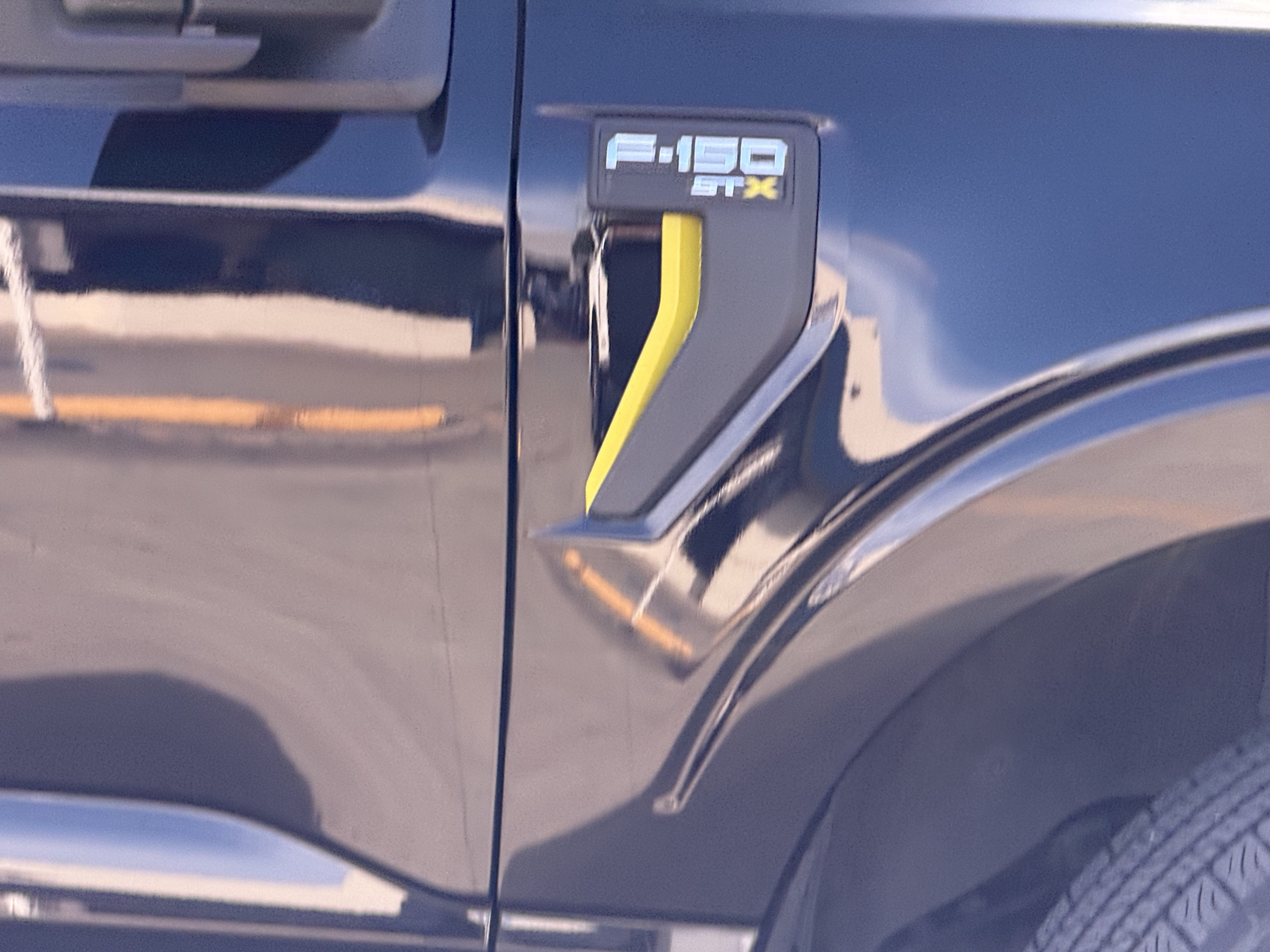 Used 2024 Agate Black Metallic Ford STX image 4