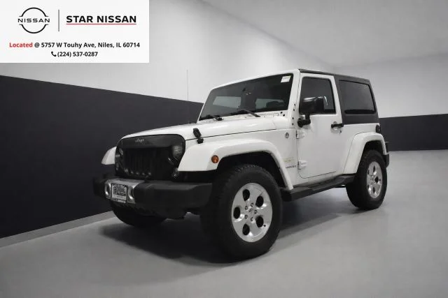 Used 2015 White Jeep Sahara image 1