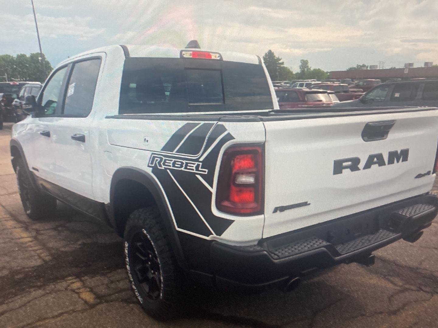 Used 2025 Bright White Clearcoat Ram Rebel image 5