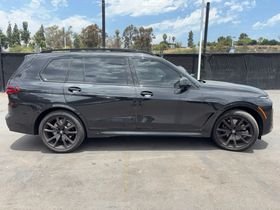 Certified Used 2025 Black Sapphire Metallic BMW xDrive40i image 2