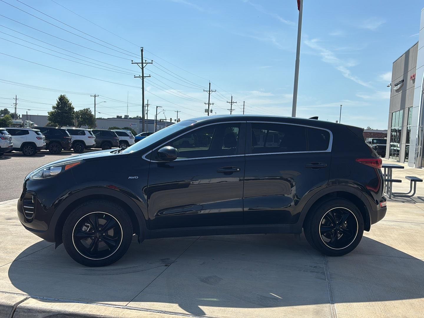 Used 2019 Kia Sportage LX with VIN KNDPMCAC0K7602484 for sale in Garden City, KS