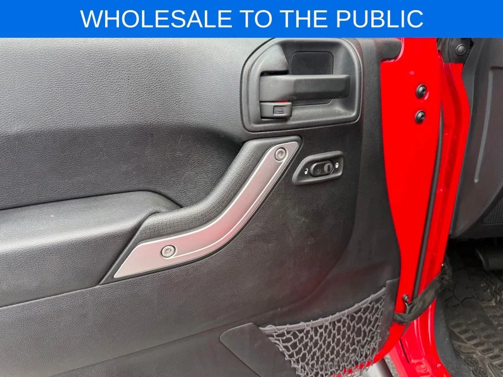 Used 2016 Red Jeep Unlimited Sahara image 5