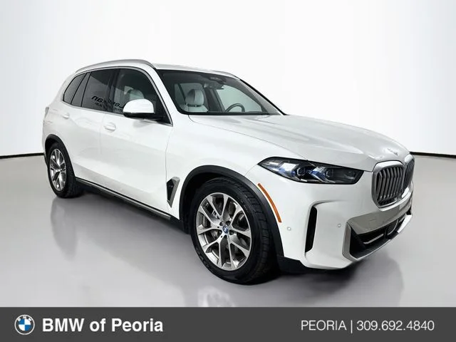 Used 2024 White BMW xDrive50e image 1